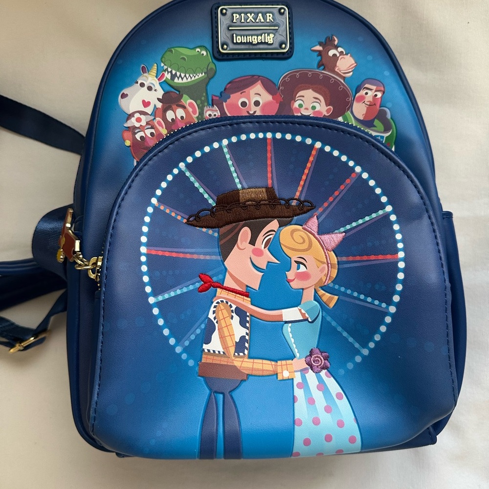 LOUNGEFLY PIXAR MOMEMT TOY STORY WOODY, BO PEEP, & TOYS BACKPACK - Picture 4 of 9